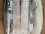 a cardboard box with a couple of wii controllers inside of it