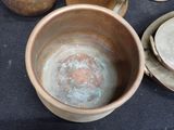 many pots and pans that are on the table