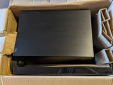 a cardboard box with a laptop in it sitting on a table