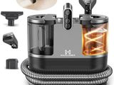 un gros plan sur une photo en noir et blanc représentant un aspirateur