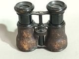 a pair of binoculars that are sitting on a table