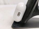 a close up of a cell phone on a stand