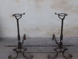 two candles that are sitting on top of each other