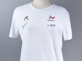 a white t - shirt with a picture of a bird on it