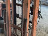 a picture of a fork lift in a warehouse