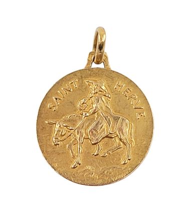 a close up of a gold coin with a horse and rider on it