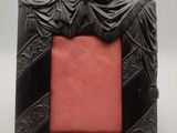 an image of a picture frame with an angel on top of it