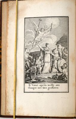 un vieux livre sur lequel figure l'image d'un homme à cheval et d'une femme à cheval