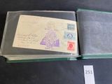 an open book with a stamp on it sitting on a table