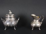 pair of antique silverplated sugar and creamers on stands