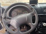 dashboard of a car with a steering wheel and dashboard controls