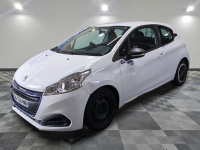 a picture of a white car parked in a garage