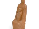 statue of a woman holding a baby in her arms