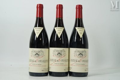 three bottles of wine sitting on top of a table next to each other