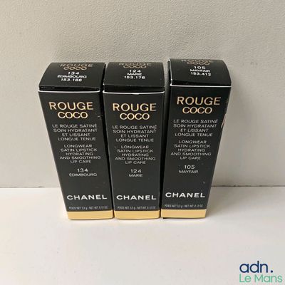 three chanel rouge coco lipsticks on a white surface