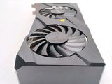 a close up of a video card with a fan