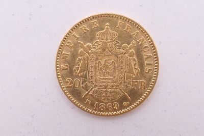 l'image d'une pièce d'or sur laquelle figurent des armoiries