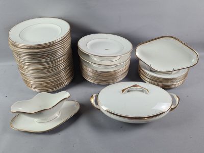 a lot of plates and spoons on the table