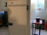 an image of a kitchen with a refrigerator in it