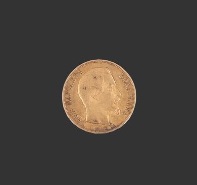 une pièce d'or représentant le profil d'un homme