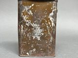 a small metal box that has some paint on it