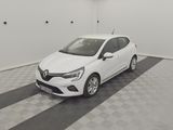 the white car is parked in the garage on the checkered floor