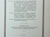 an old book with a poem written in french on the front of it