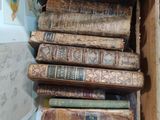 a lot of books in a box on the table