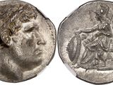 a silver coin with an image of a man on it