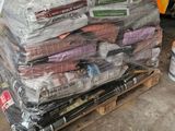 a pallet full of assorted items sitting on a pallet