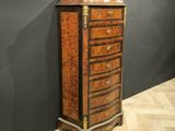 an antique chest of drawers in the style of louis ii
