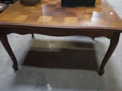 a small table with a clock on top of it