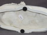 an image of a white purse sitting on top of a table