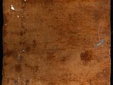 a close up of a piece of wood with some paint on it