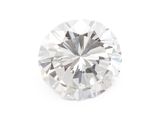 a close up of a diamond on a white surface