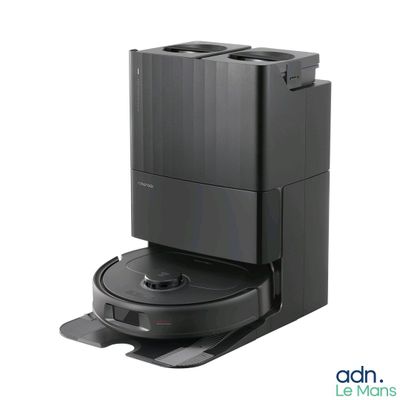 une image représentant une cafetière noire avec un porte-tasse