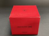 a red box with a logo on it sitting on a table