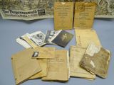 some old papers are sitting on top of a table
