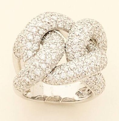 an image of a white gold and diamond ring on a white background