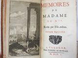 an old book with a picture of a man and a woman