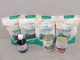trois sacs de provisions posés sur une table