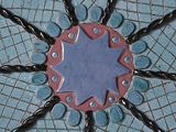 a picture of a decorative tile with a star design