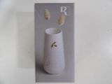 a card with a picture of a vase with some flowers in it