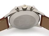 an image of a close up of a watch on a white surface