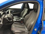 a blue car with black seats in the back of it