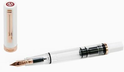 a close up of a fountain pen and a pen with a pen tip