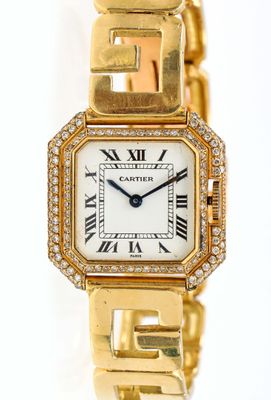 CARTIER. Montre "Ceinture" en or.