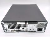 the back view of a computer with a hard drive on top of it