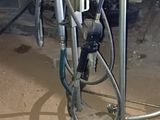 an image of a bike being worked on in a garage