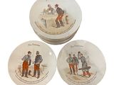 trois assiettes sur lesquelles figurent les portraits d'un homme et d'une femme